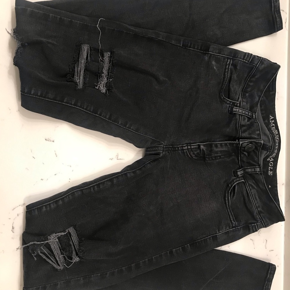 Women’s distressed black jeans